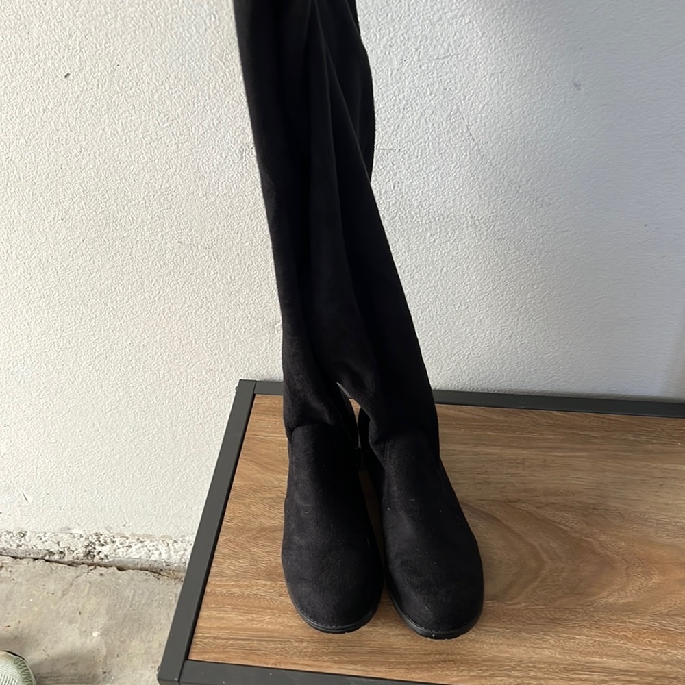 Over the knee flat boots